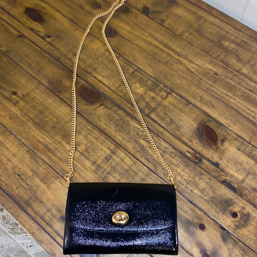 Black leather with removable gold chain clutch